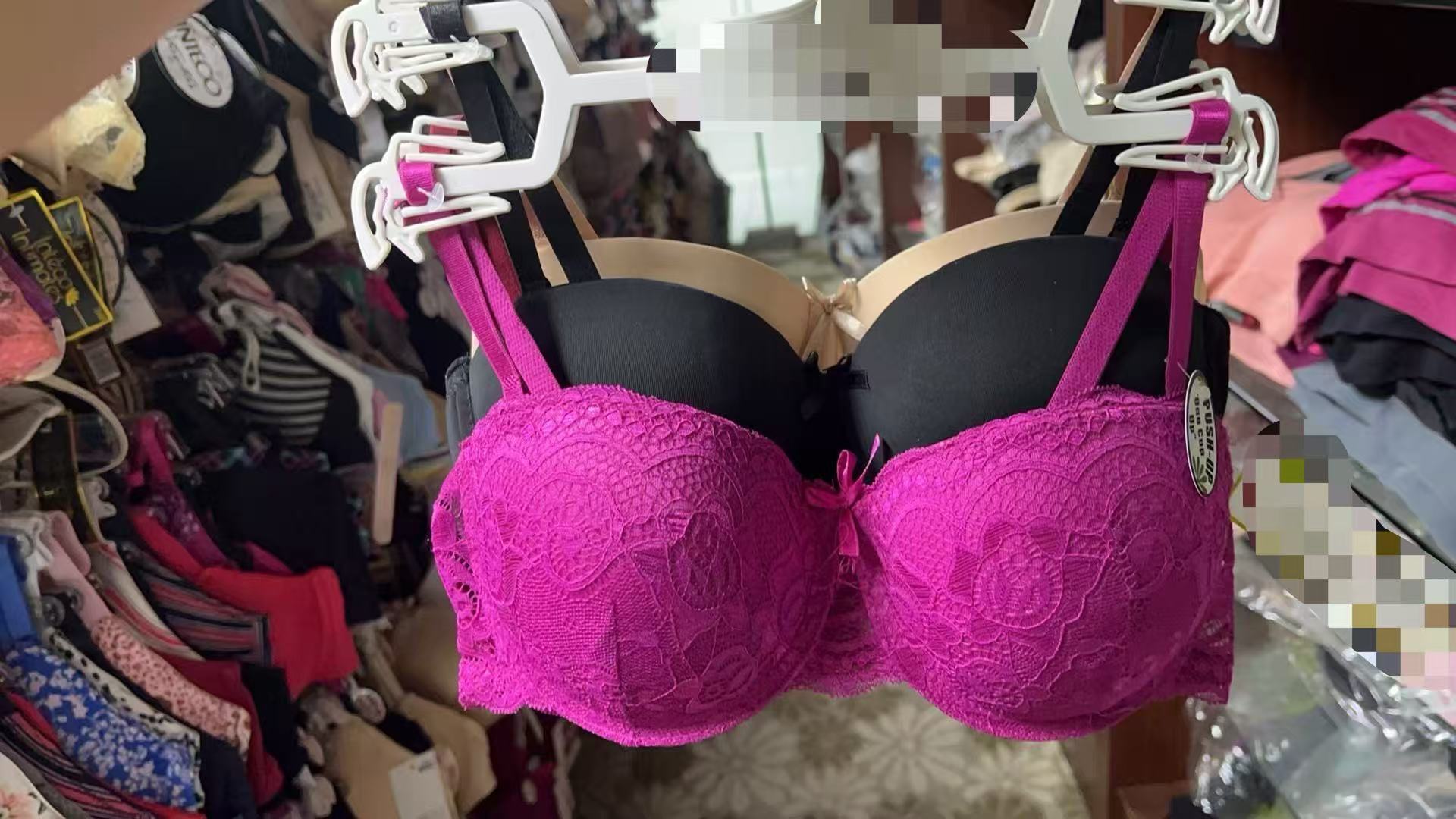 Undergarment sample hanging in a supplier workshop setting